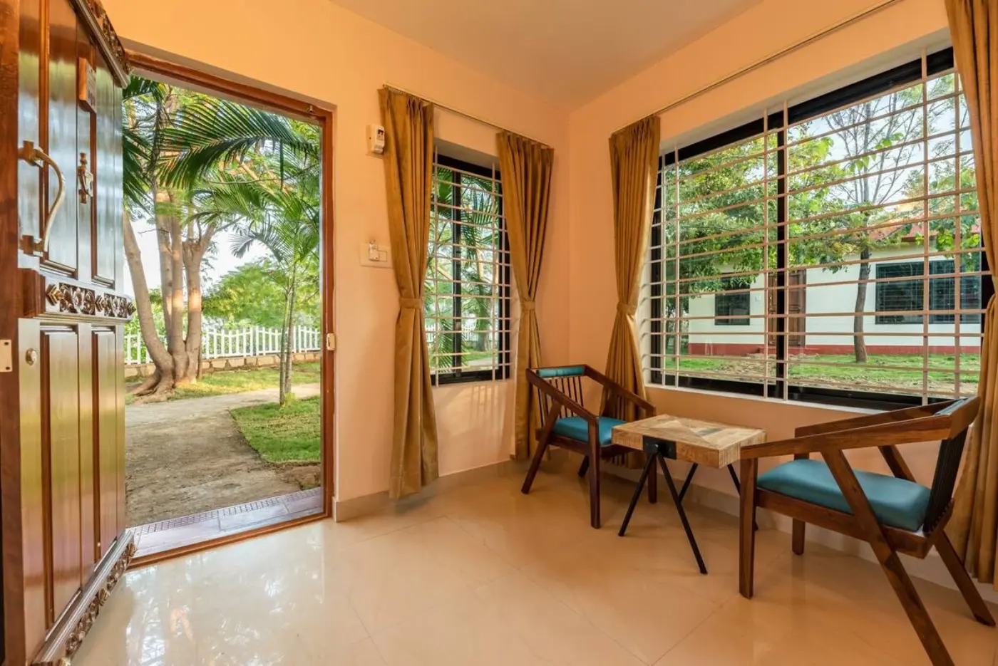 Private verandah sit-out of The Verandah Suite, opening onto the garden